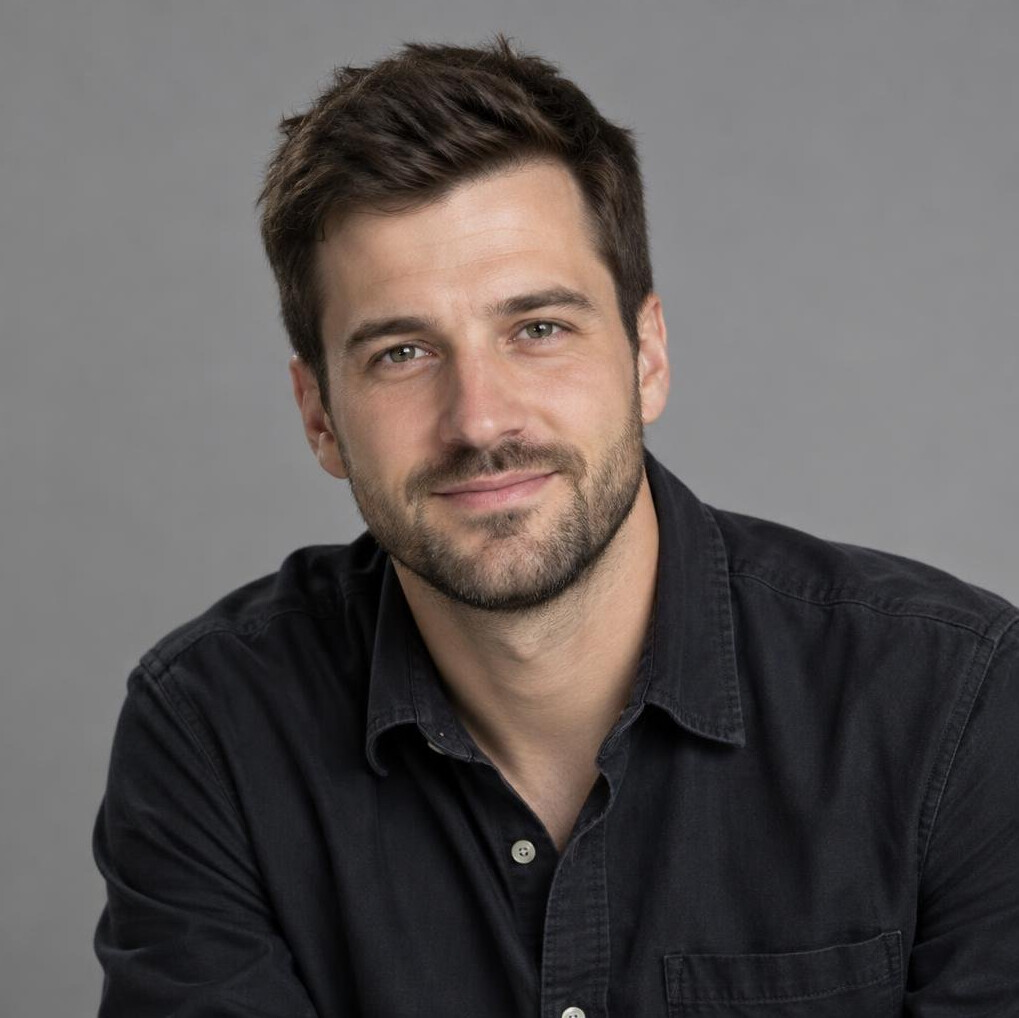 Portrait of a man with a beard in a dark shirt