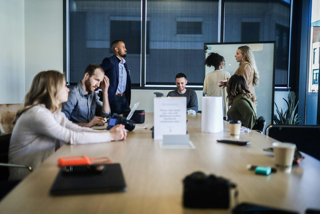 business people negotiating in meeting room
