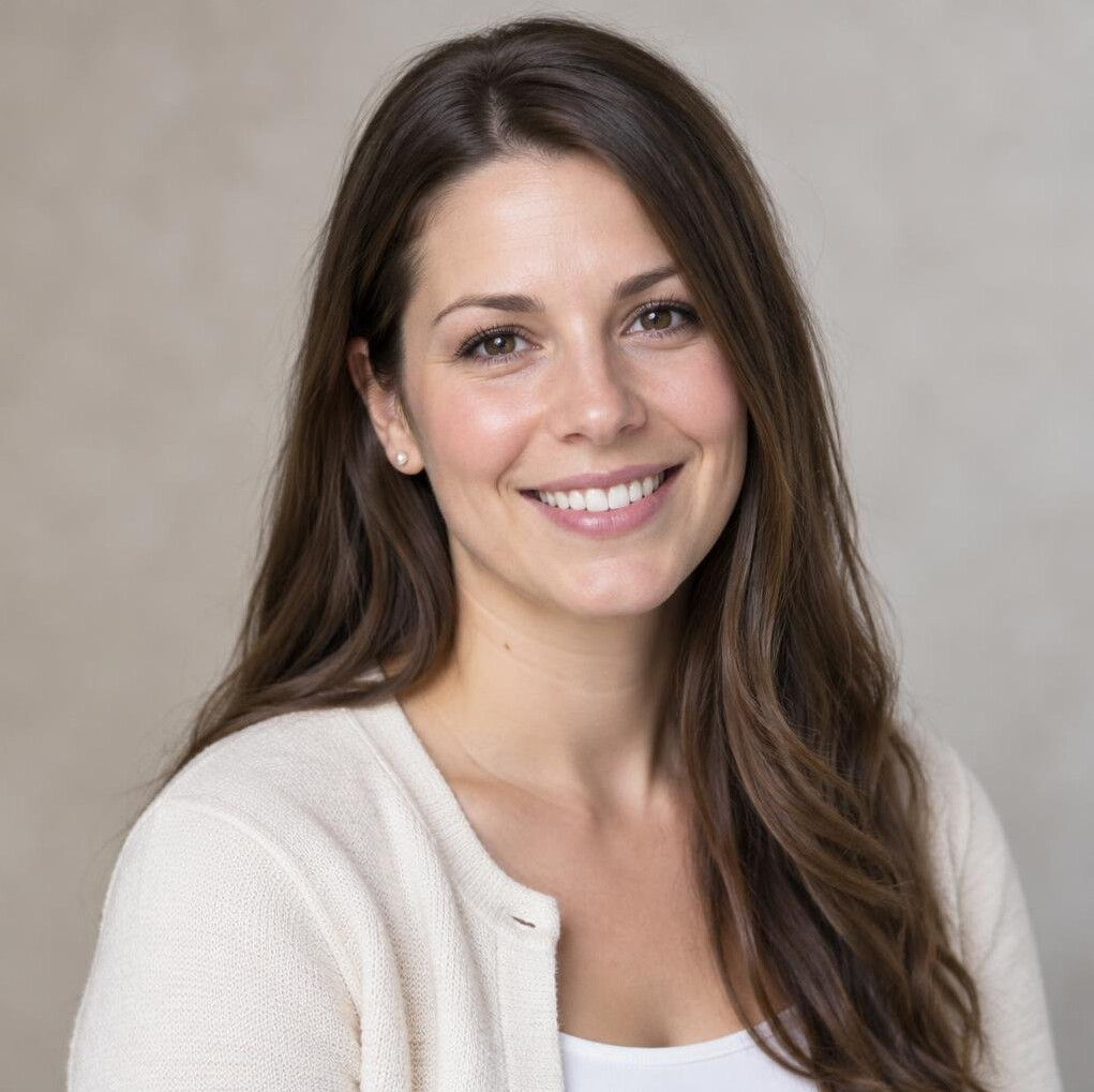 Portrait of a woman with long brown hair smiling